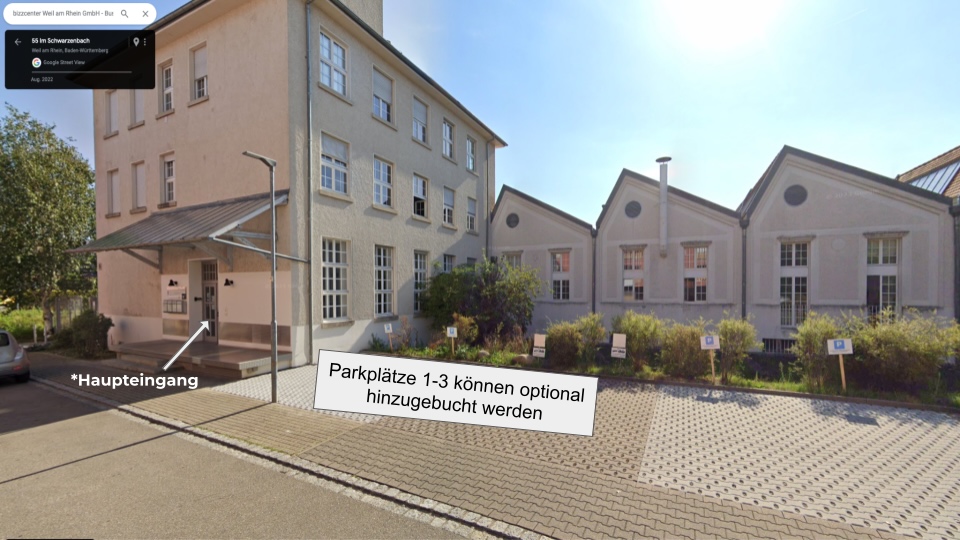 Haupteingang bizzcenter Weil am Rhein mit Parkplätzen